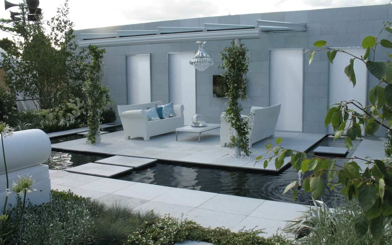 Award winning garden with sofa and water feature