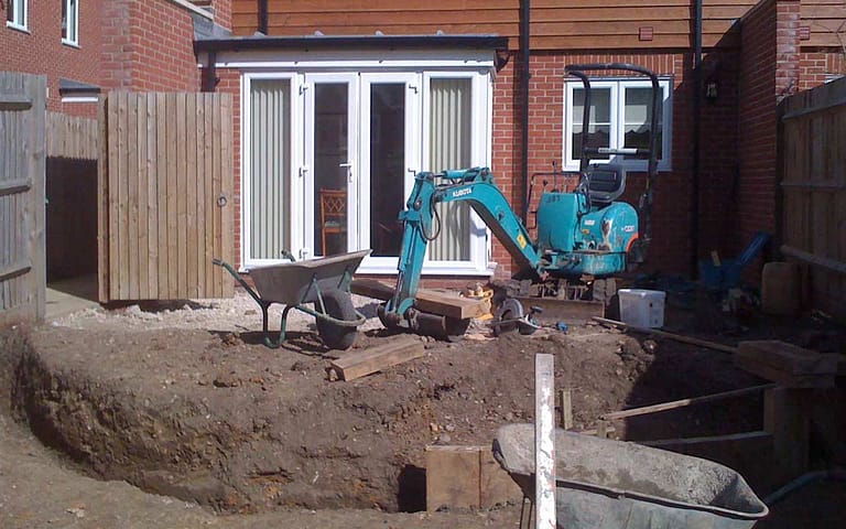 Image of digger constructing a garden